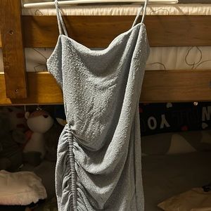 A sparkly gray dress that is perfect for prom.